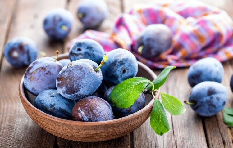 plums in bowl
