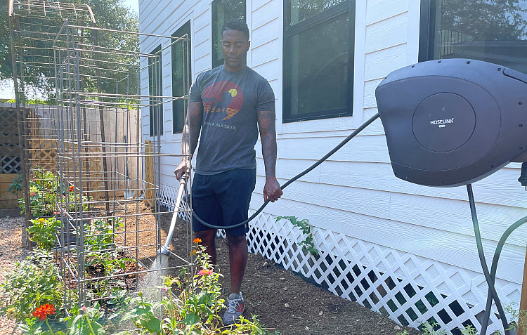 Big City Gardener watering using Hoselink