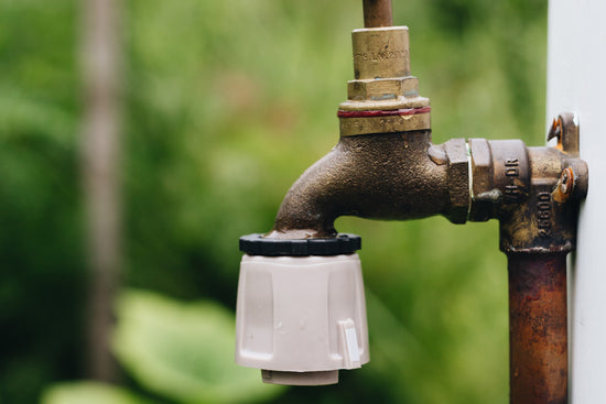 tap-hose-connector-attached-to-tap