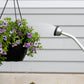 close up of the long reach shower wand head watering hanging flowers
