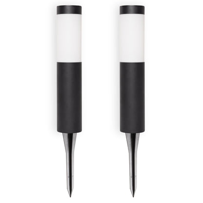 Two solar path lights on white background
