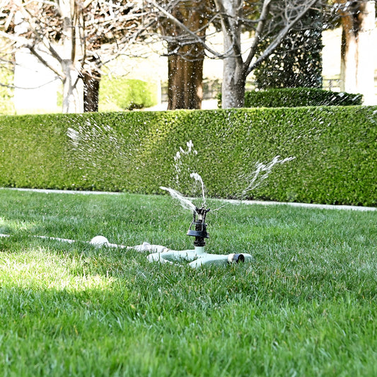 wobble sprinkler watering grass