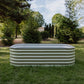 6 in 1 Garden Bed setting on the grass front on with three trees in the back ground.