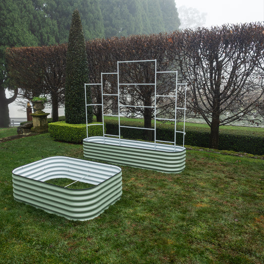 Metal Wall Trellis and 9 in 1  garden bed behind a 6 in 1 garden bed on grass