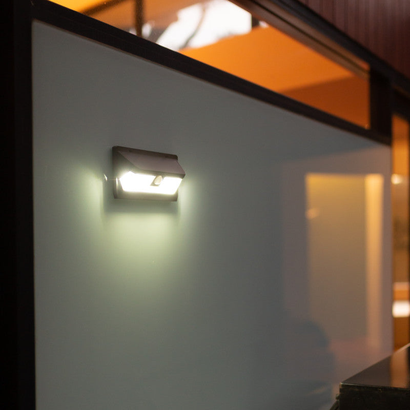 Example of solar light mounted to the wall with double sided tape. 