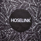 close up of charcoal fern pattern with hoselink logo in the middle